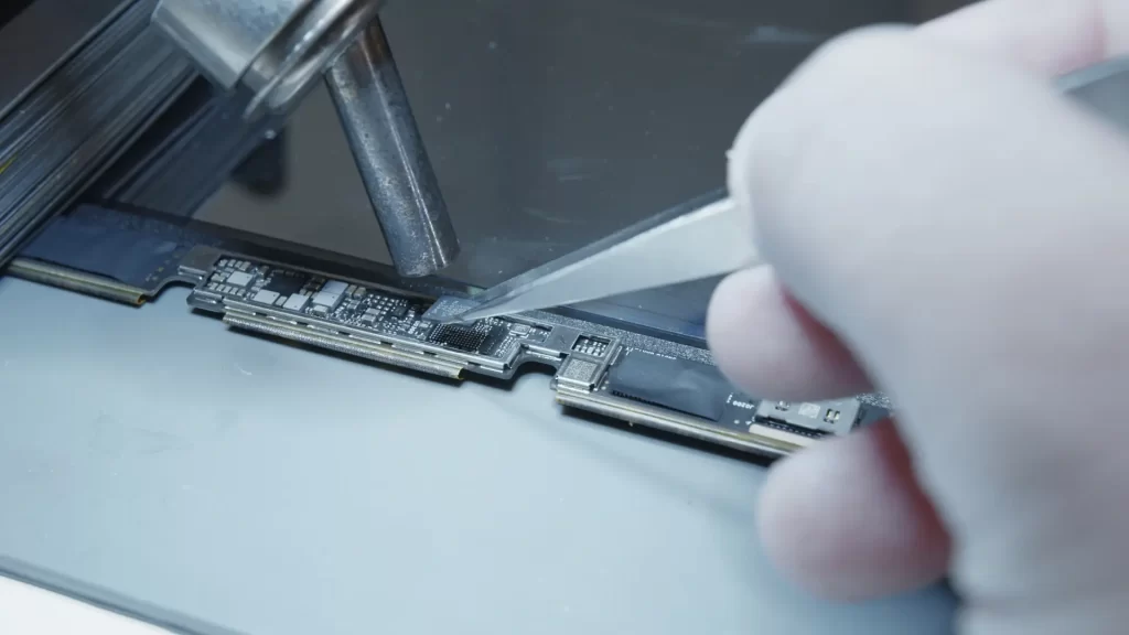 Soldering for a Cracked screen repair on a 14" MacBook Pro